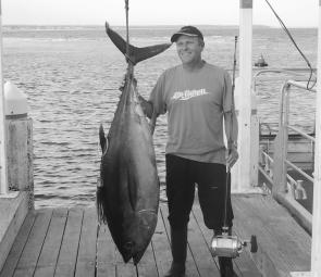 Craig Stuckey with his 54.6kg bigeye tuna taken on a JB Pink Chook and 37kg tackle. Photo courtesy of Dave Venn.